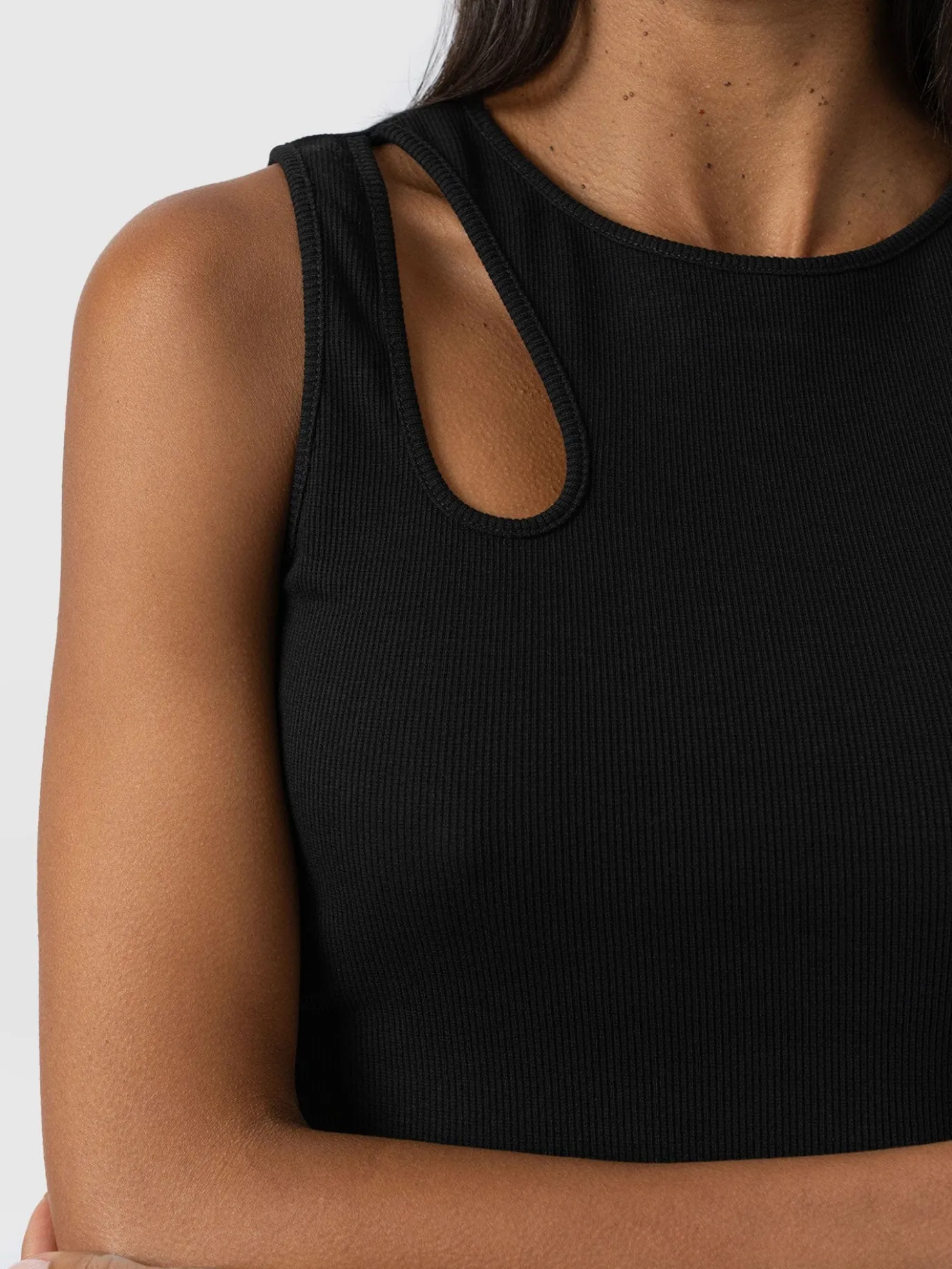 T-shirts & Tanks|Saint and Sofia Axel Cut Out Vest - Black
